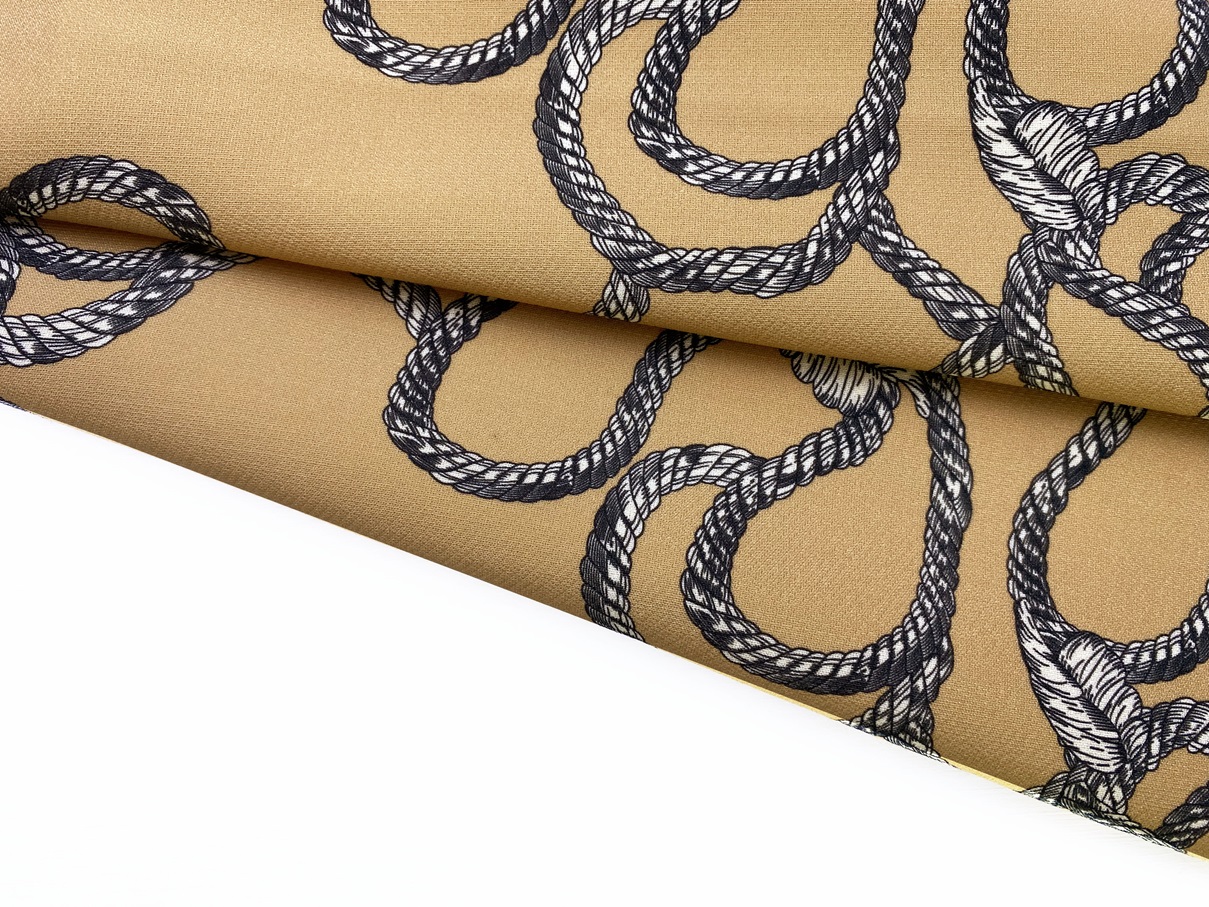 Ткань Платьевая  карамельного цвета с принтом  кант с узлами 29488 4